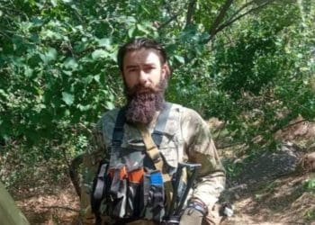 Тарасом Кучмієм