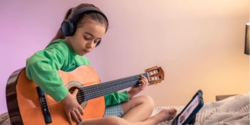 навчання грі на гітарі