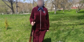 жінка з рушницею